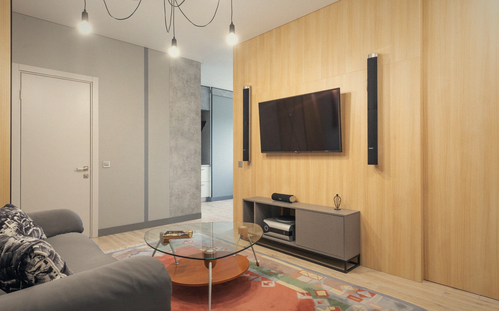 a pair of floorstanding speakers in a real living room