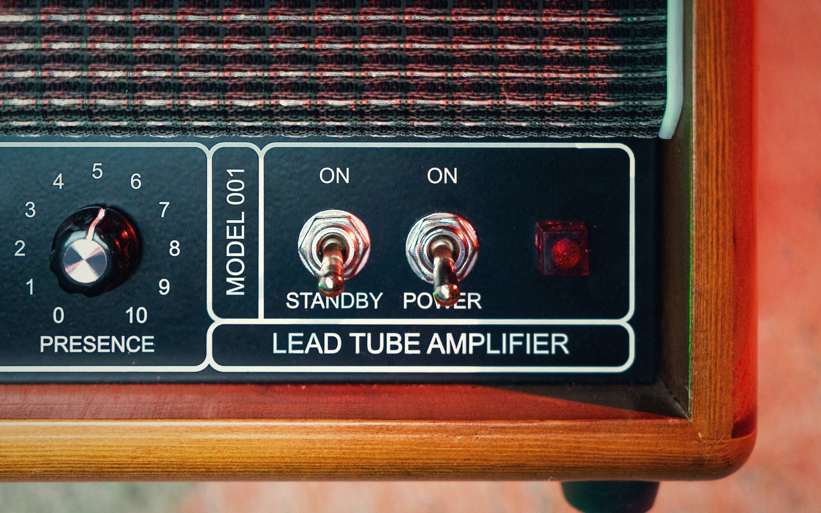 a valve amplifier glowing in a dim room